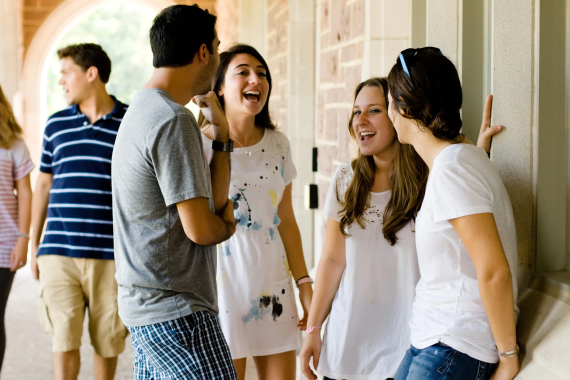 Connecting Jewish students standing around laughing