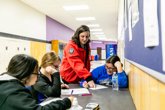 Creating Engaging Learning Environments, volunteer helping students