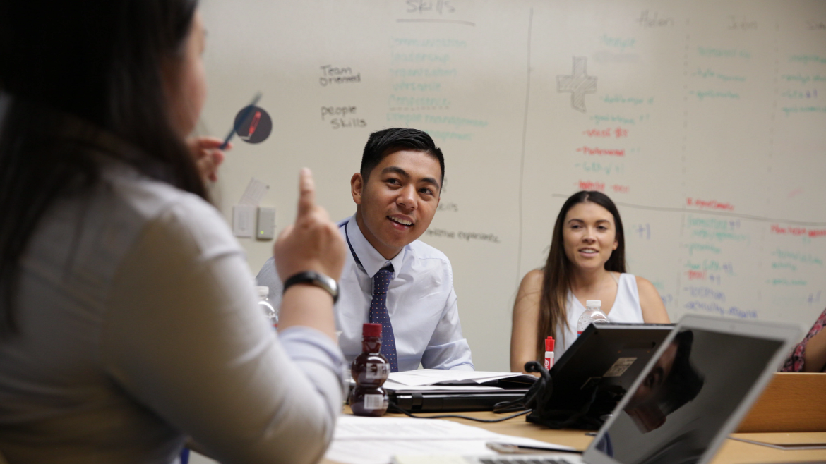 Three colleagues in discussion