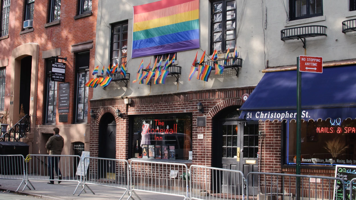 Stonewall Inn, sidewalk, rainbow flags