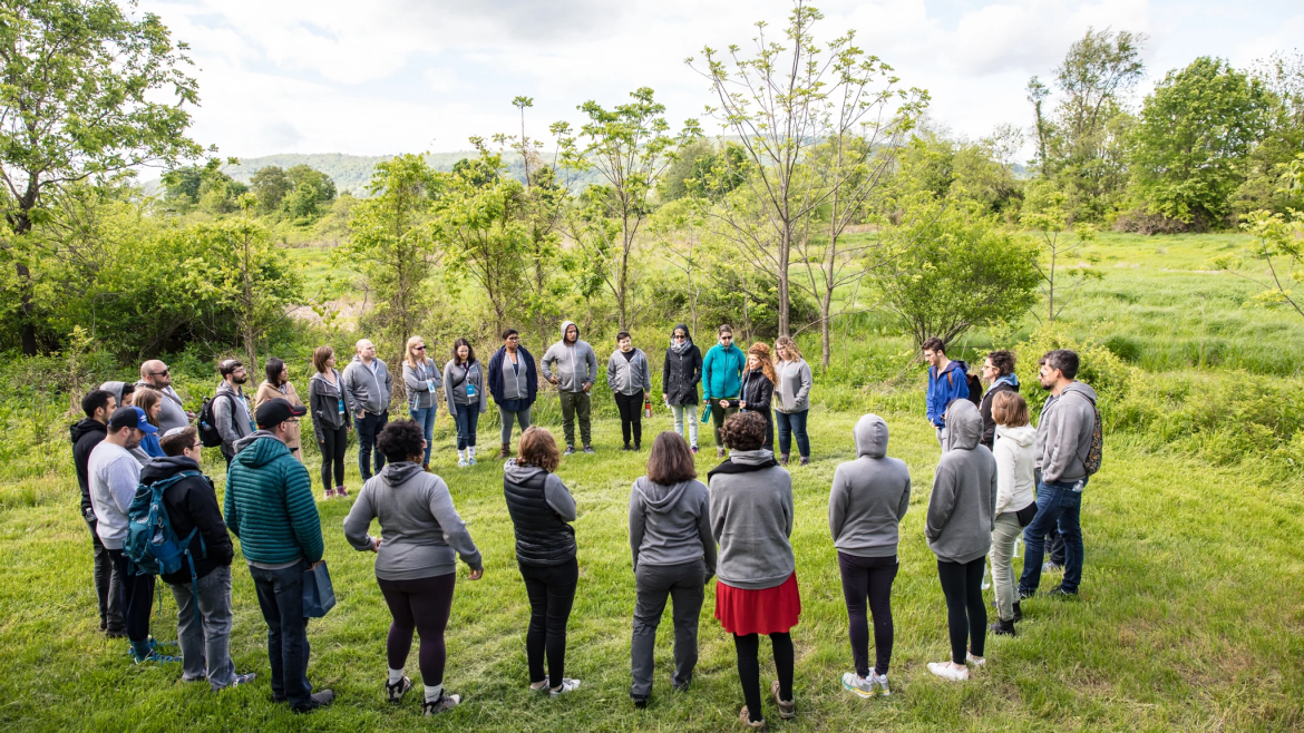 Group of people outdoors in a circle