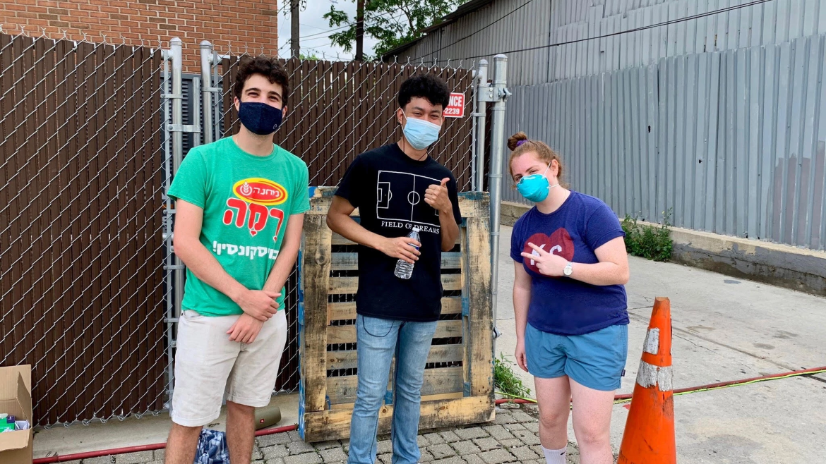 Volunteers wearing masks outside a foodbank in Chicago