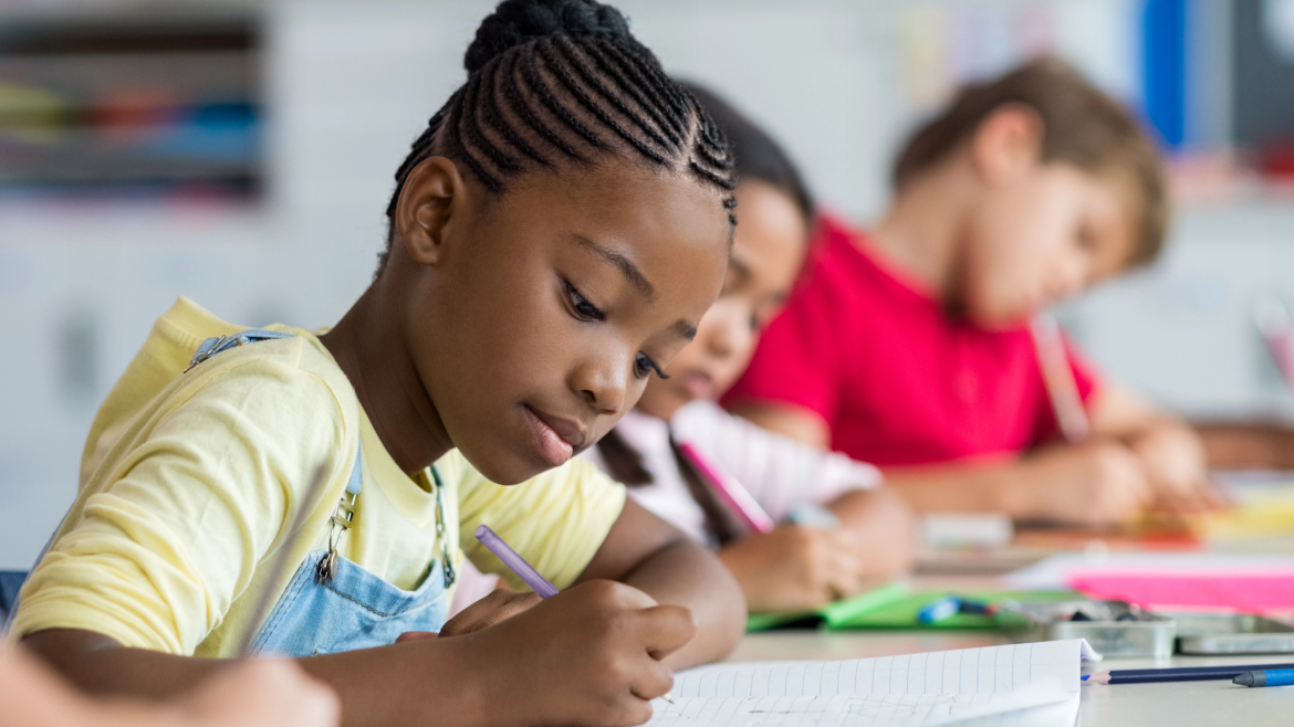 Elementary school students at their desks