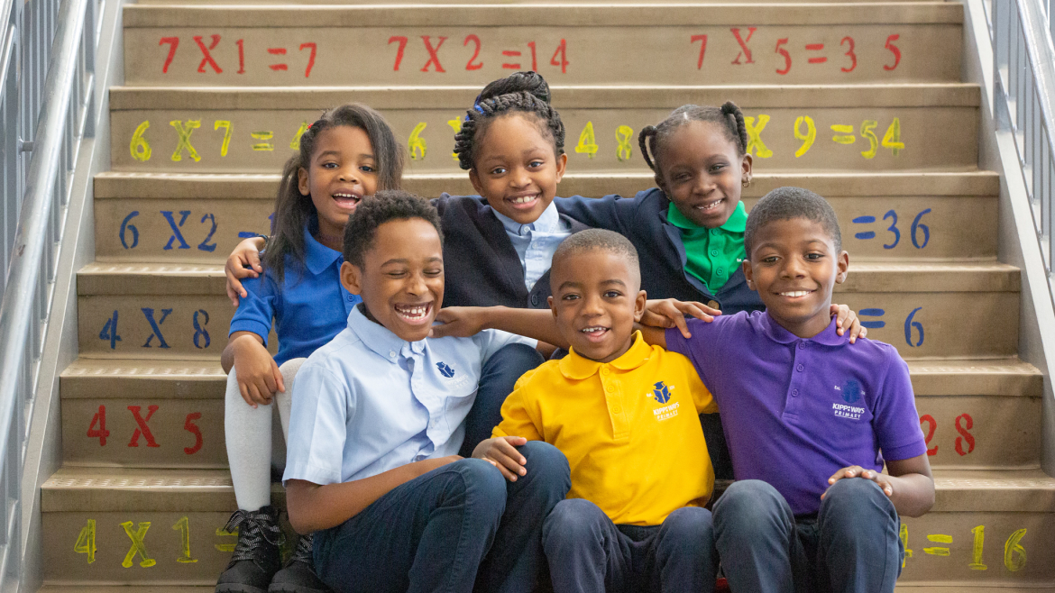 Smiling elementary grade students