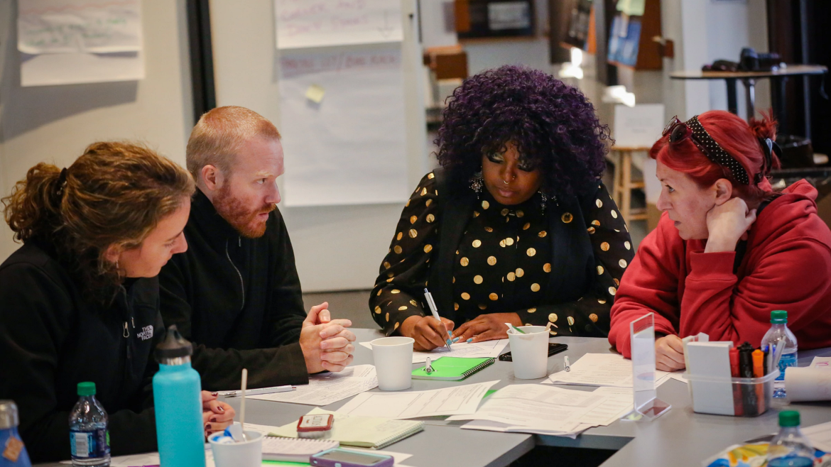 Four teachers in discussion