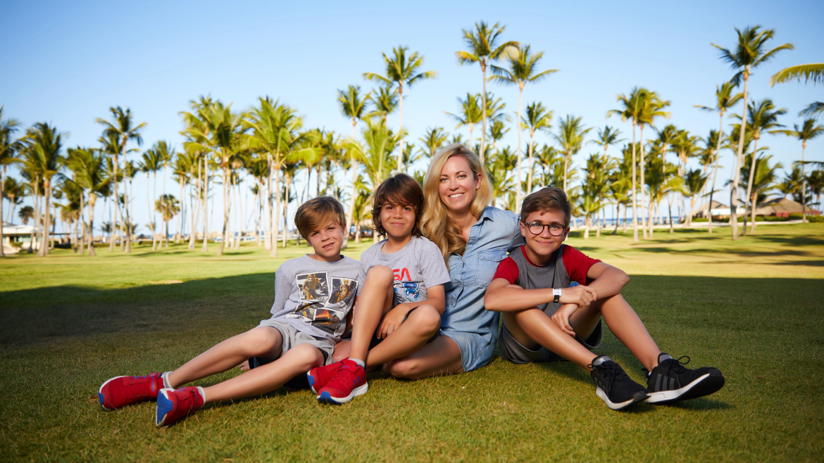 Michelle Muller poses with her three kids