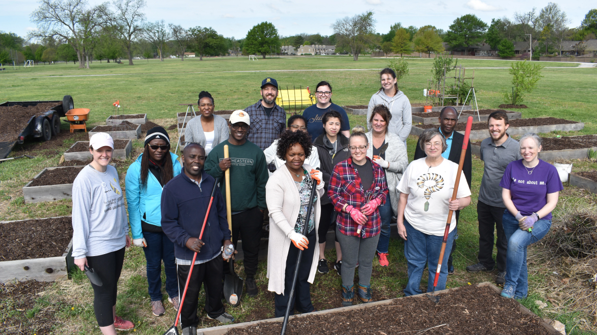 Hunger Free Group of people preparing a raised garden