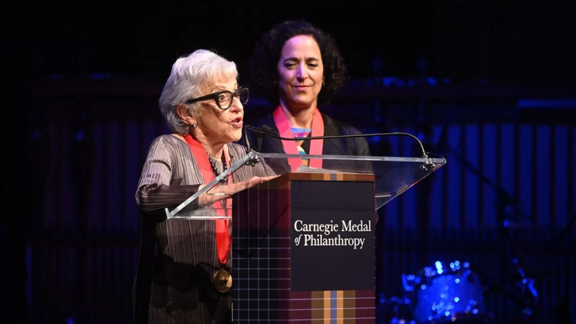 Lynn and Stacy Schusterman sharing remarks at the Carnegie Medal of Philanthropy award ceremony