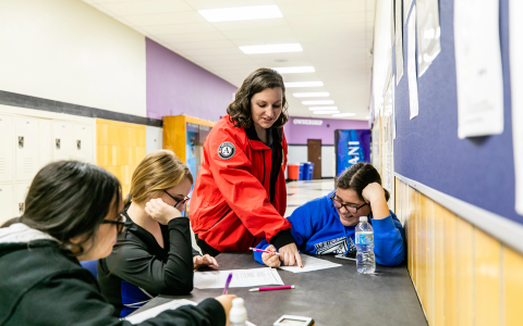 Creating Engaging Learning Environments, volunteer helping students