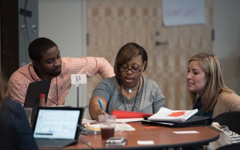 Adult teacher collaborating - Leading Educators